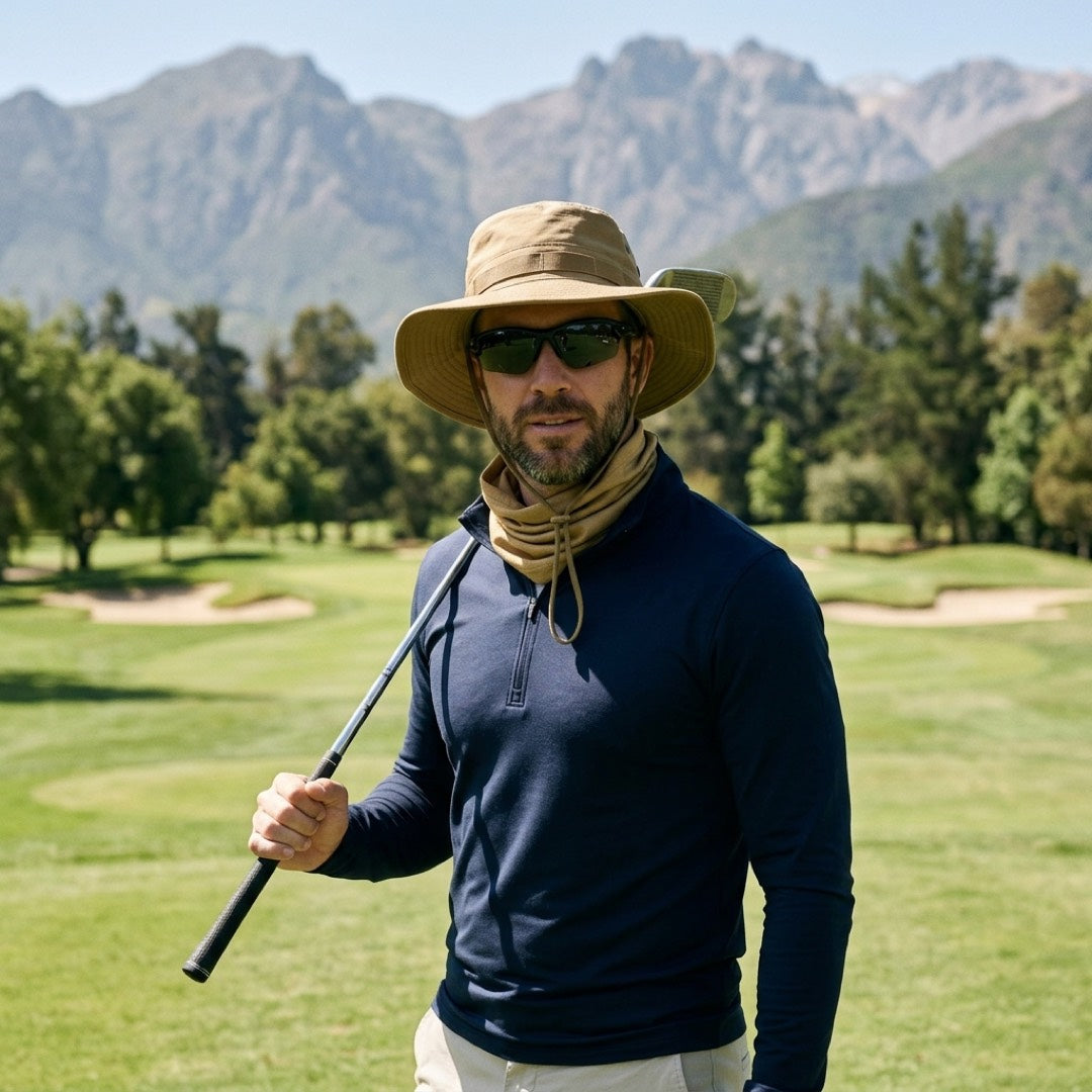 Golfer wearing the khaki ESCUDO hat